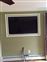 55" LCD Smart TV Recessed in Living Room Wall with Picture Frame
